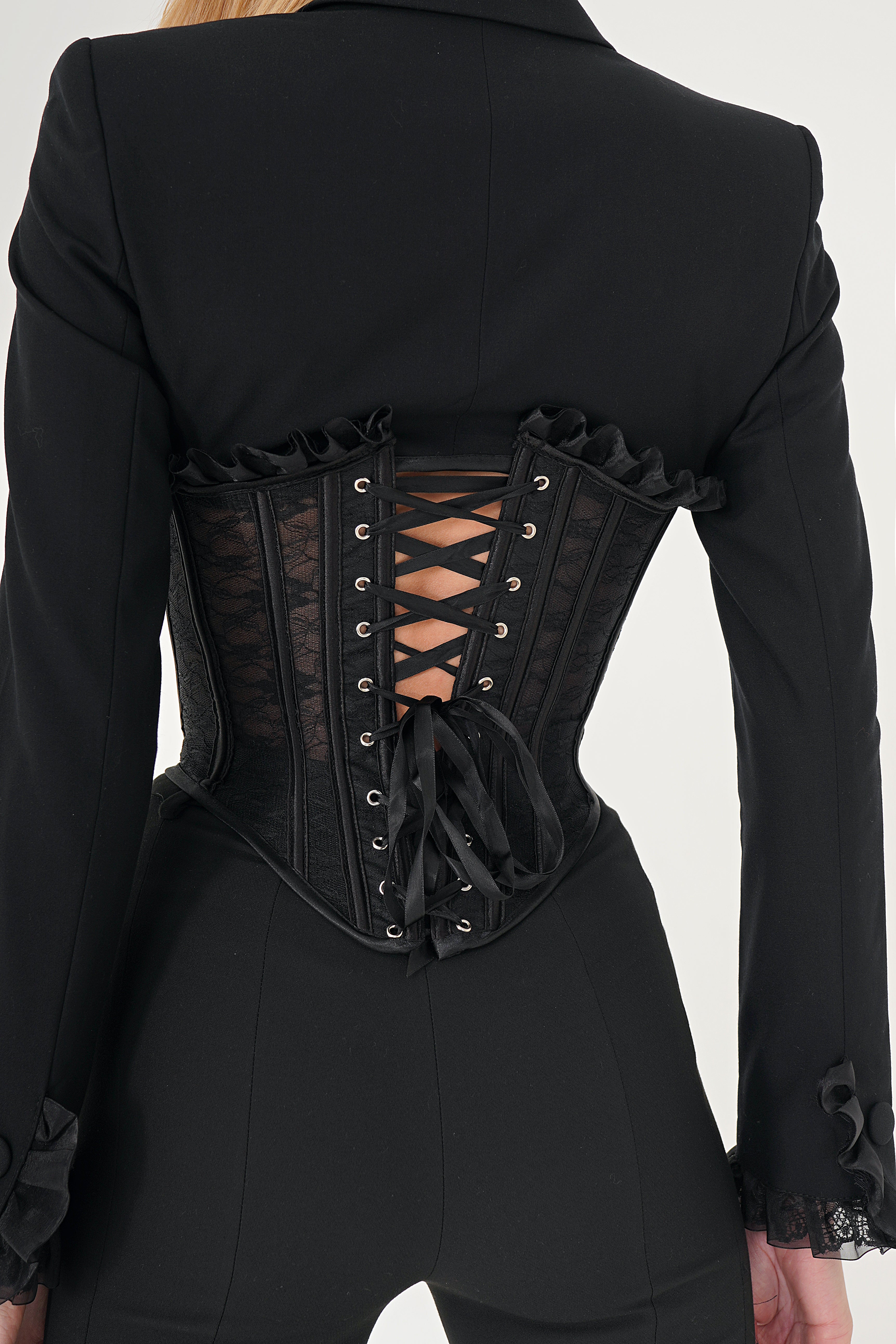 A Lace-Up Corset Over A Blazer  9 Seriously Easy Outfits For